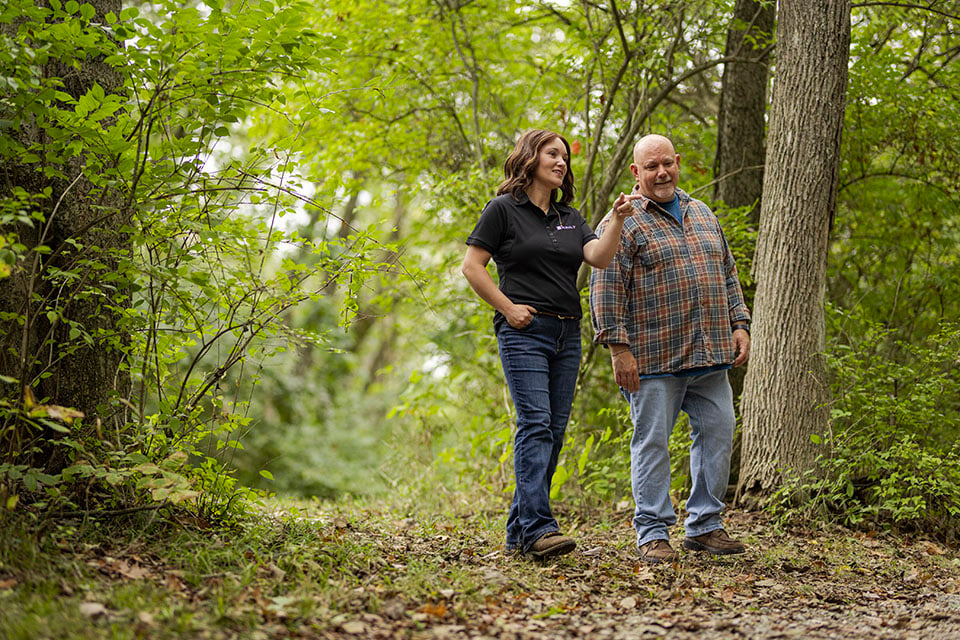 Dough Rabe and Rural 1st Loan Officer Walk Land at Walnut Ridge