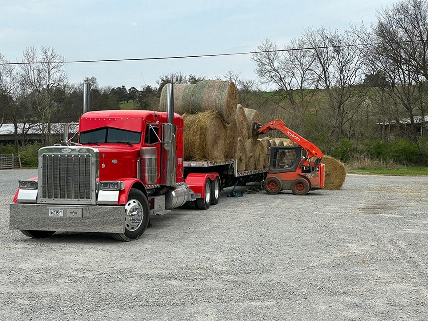 Hay being loaded on a semi headed to Texas to support ranchers impacted by wildfires