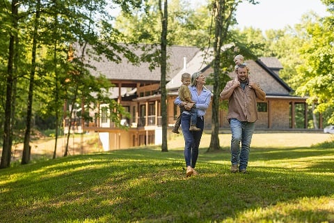 Richmond Family walks through their side yard