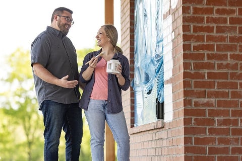 Morris Family tests paint colors on the exterior of their home